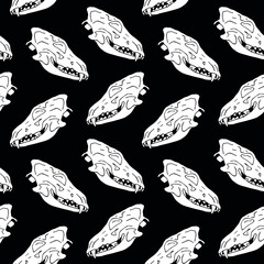 Vector seamless pattern of hand drawn doodle sketch dog wolf skull isolated on black background