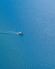 Boat Crossing Ocean Aerial View