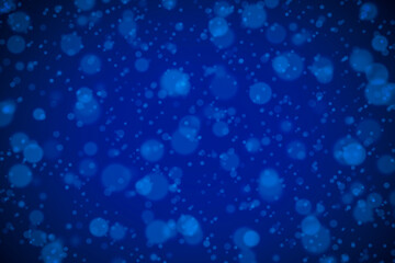 Abstract blue defocused background with bokeh.