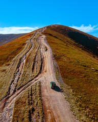 aerial view of off road attraction road to the top of carpathian mountains © phpetrunina14