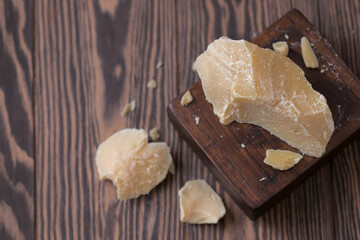 Raw organic Cocoa butter. Chocolate ingredient. Space for text