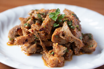 Spicy Grilled Pork Neck Larb, a popular Thai dish