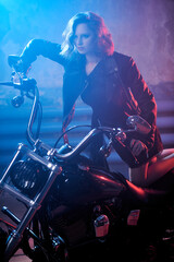 Fototapeta na wymiar girl on a motorbike