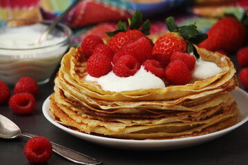 Russian cuisine national dish bliny with fresh berries