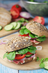 Homemade sandwiches with ham and vegetables