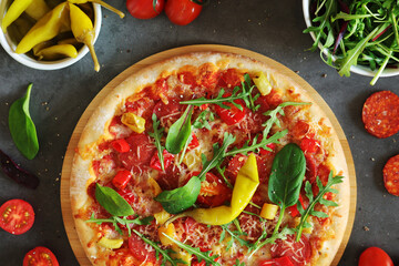 Pizza diavolo flat lay with pepper