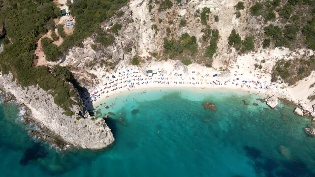 aerial view of lefkas beach at sunny summer day people sunbathing greece vacation