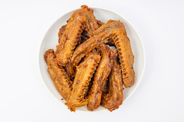 A dish of delicious spicy marinated duck wings