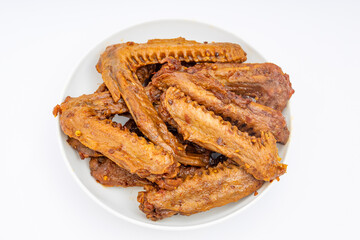 A dish of delicious spicy marinated duck wings