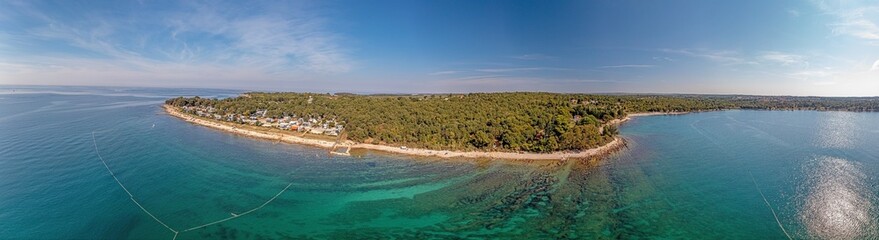 Drone panorama over Istrian Adriatic coast near Porec with Sadalinka bay