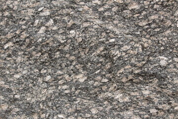the gray stone structure looks like a wall