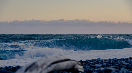 Seascape shot of Pacific Ocean waves crashing onto coast of Miho-no-Matsubara Beach in Shizuoka...