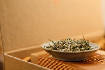 Chinese Fujian boutique fried dried tea leaves in a plate