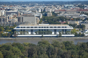 Washington, DC, USA - October 27, 2021: Aerial View of the John F. Kennedy Center for the Performing as Seen from Across the Potomac River in the Tallest Skyscraper in Arlington on a Bright Fall Day