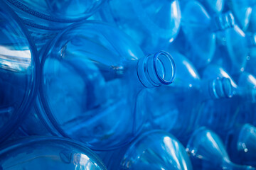 Blue plastic bottle for the cooler. 5 Gallon Polycarbonate PET Bottle for Drinking Water. Folded...