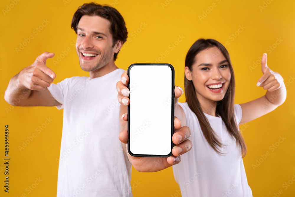 Aufkleber couple showing blank empty white smartphone screen for mock up