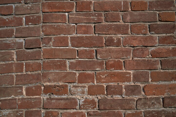 Old brick wall, old texture of stone blocks closeup