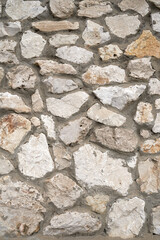 Old brick wall, old texture of stone blocks closeup