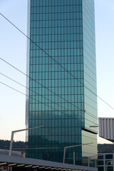 Obraz premium Office tower Prime Tower at industrial district of City of Zürich on a beautiful autumn evening. Photo taken October 9th, 2021, Zurich, Switzerland.