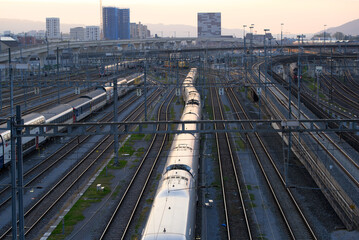 Naklejka premium Aerial view of train at track field of Zürich main station on a sunny autumn evening. Photo taken October 9th, 2021, Zurich, Switzerland.