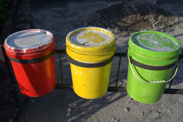 three colorful rubbish bin 