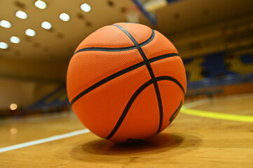 Basketball ball on the court in sport arena - 466007898