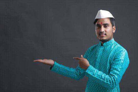 Young indian man (pilgrim) in traditional wear.