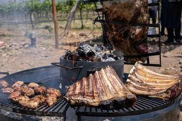 Traditional Argentine ribs grilled with charcoal and fire