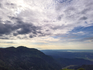 green mountain with dramatic sky at morning from hill top