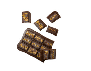Milk chocolate bar with nuts on a white background.Chocolate dessert.