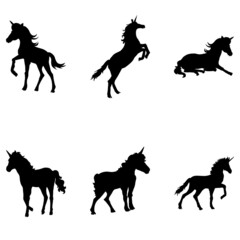set of fine unicorn silhouettes - running, rearing and jumping magic horses