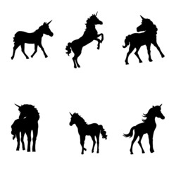 set of fine unicorn silhouettes - running, rearing and jumping magic horses