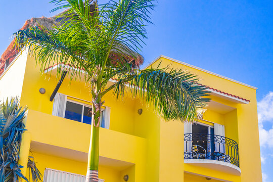 Typical orange residence hotel condominium building Playa del Carmen Mexico.