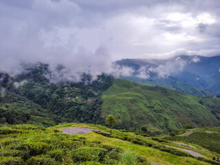 green mountain with dramatic sky at morning from hill top