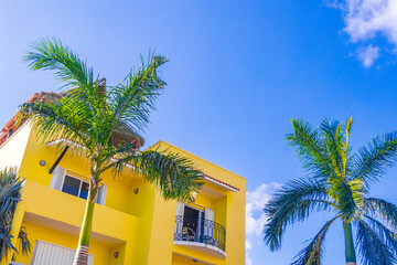 Typical orange residence hotel condominium building Playa del Carmen Mexico.