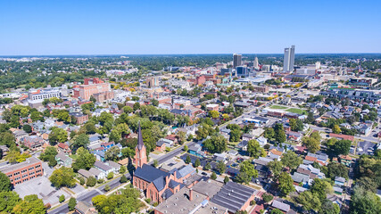 Aerial of Fort Wayne, Indiana with church in front and downtown in background