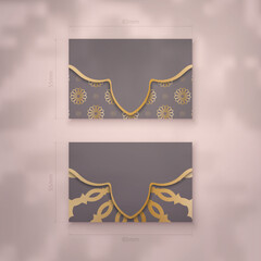 Business card in brown color with greek gold pattern for your contacts.