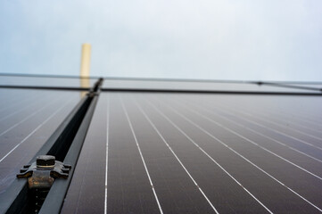 Side support bracked between solar panels on a new installation on a residential roof