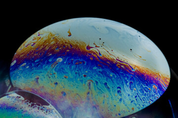 macro soap bubbles made with dish soap.
detergent bubbles. Imitation of an unknown planet. Children's entertainment. Science fiction.