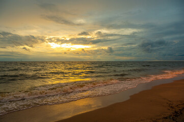 Sunset of Bang Saen Beach in Chonburi, famous beach for local tourists near Bangkok, Thailand