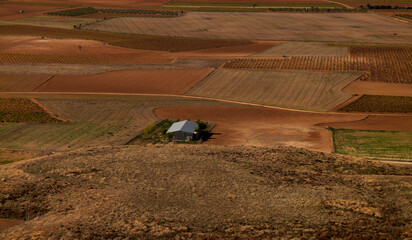 Aerial view of a country house in field in Castilla La Mancha, Spain
