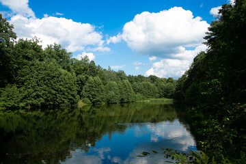 Fototapeta na wymiar Clouds over the river. Poland