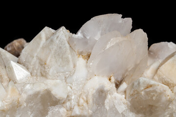 Macro mineral stone Snow quartz with calcite on a black background