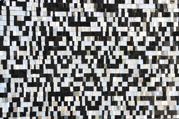 Black and white square tiles. Abstract background. Pixeled texture imitation.