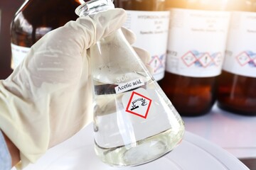 Acetic acid in glass, chemical in the laboratory