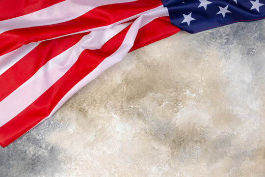American flags on gray grunge table background, image for 4th of July Independence Day