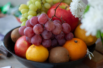 Naklejka na ściany i meble Fresh fruit on plate Isolated on white.