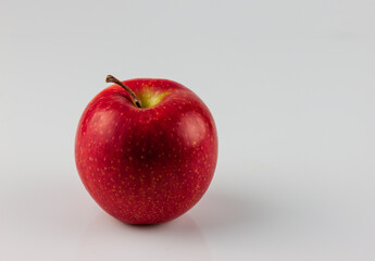 Fresh red apple on white background.