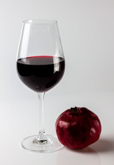 glass pomegranate juice and fruits.