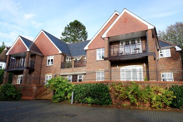 Large modern houses with balconies in the village of Chorleywood, Hertfordshire